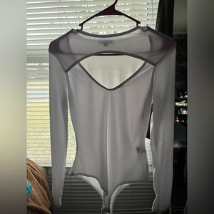 White bodysuit with mesh sleeves. Just a little too see through for my liking!